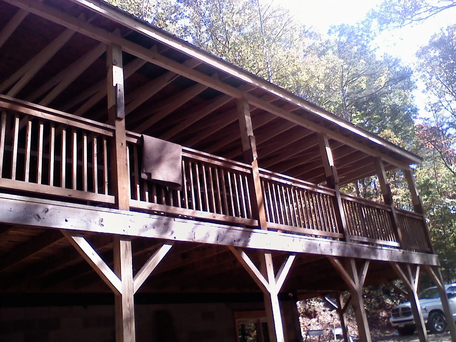 Timber framing under a new elevated porch and deck — Roof Leak Repair in Lambertville by Roofing Brothers